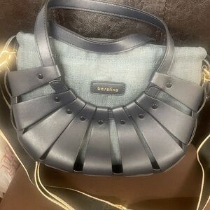 Like new Bosalina boat shaped purse
